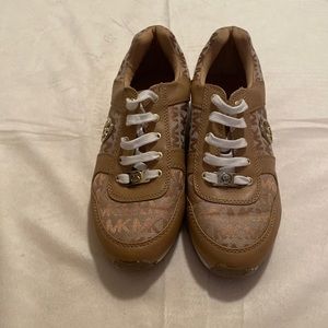 Tan, white and gold Michel Kors tennis shoes. *tween size 4/women’s size 6.5